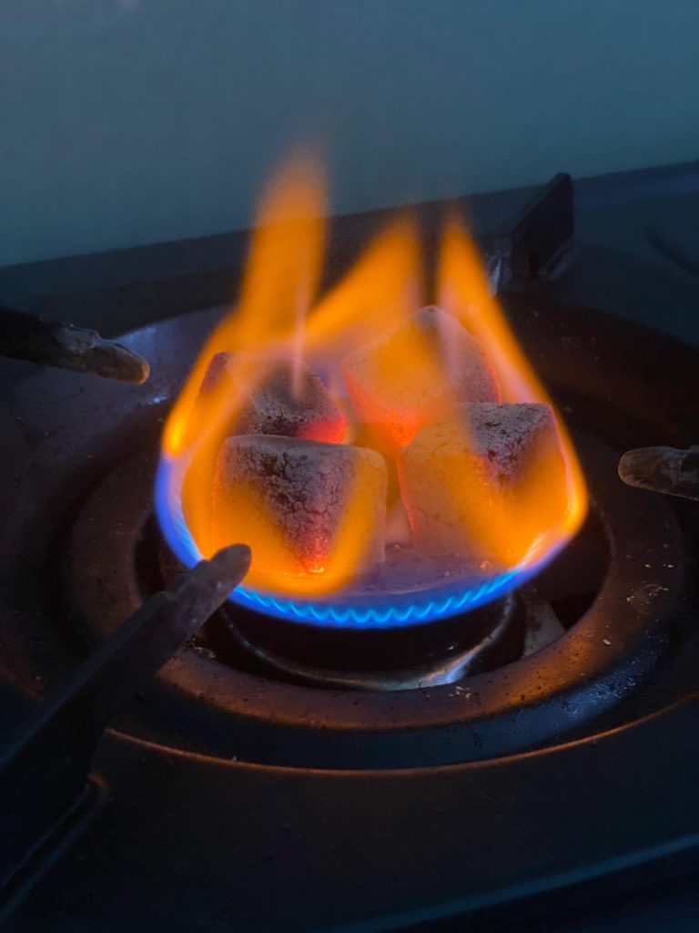 Burning shisha charcoal